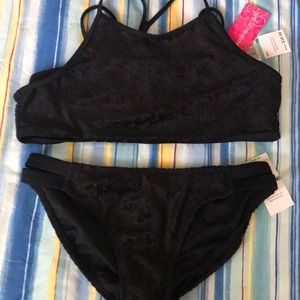 Black two piece bikini velvet sheen to it.